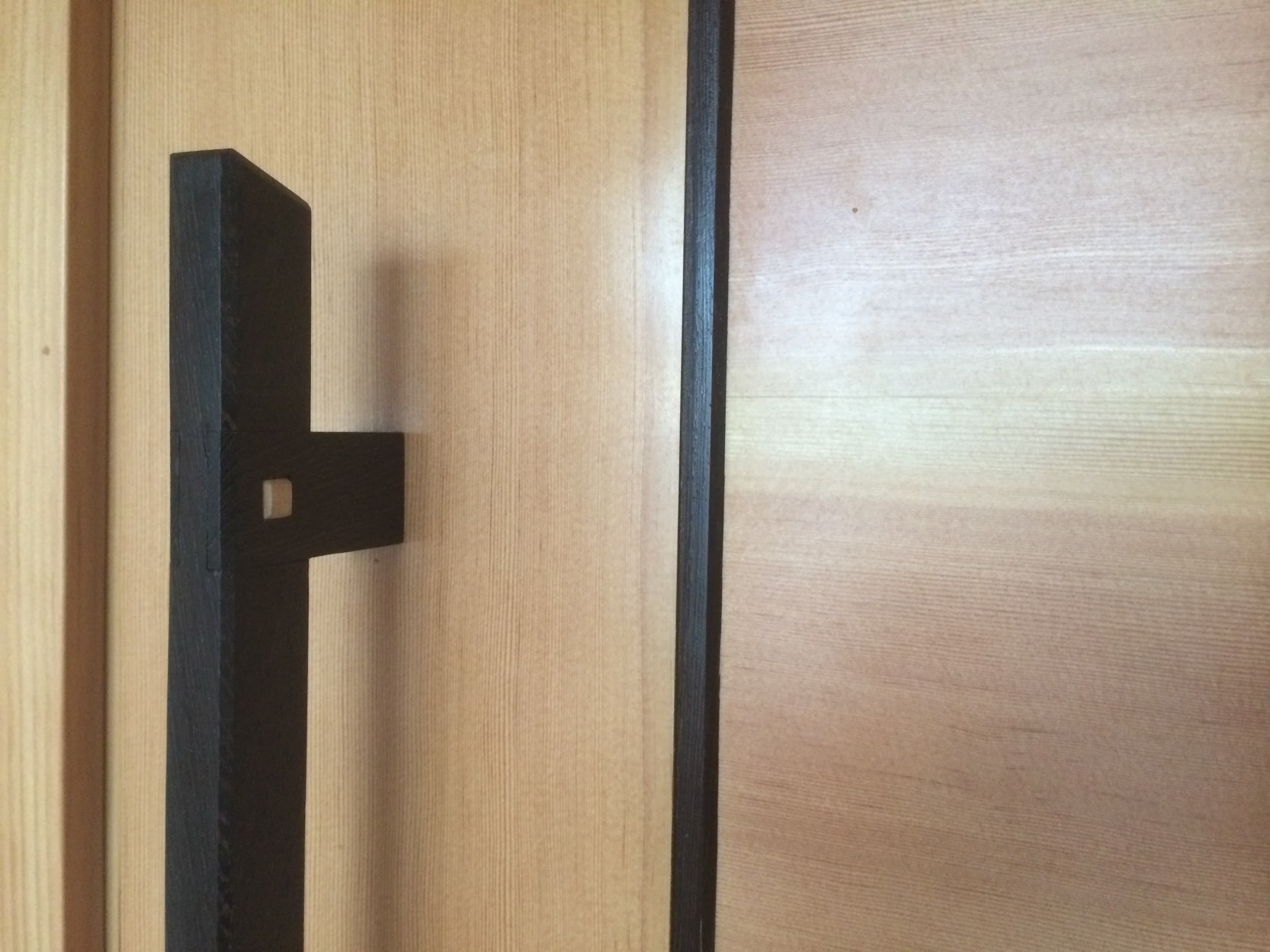 Door hardware and joinery detail by Heartwood Cabinets